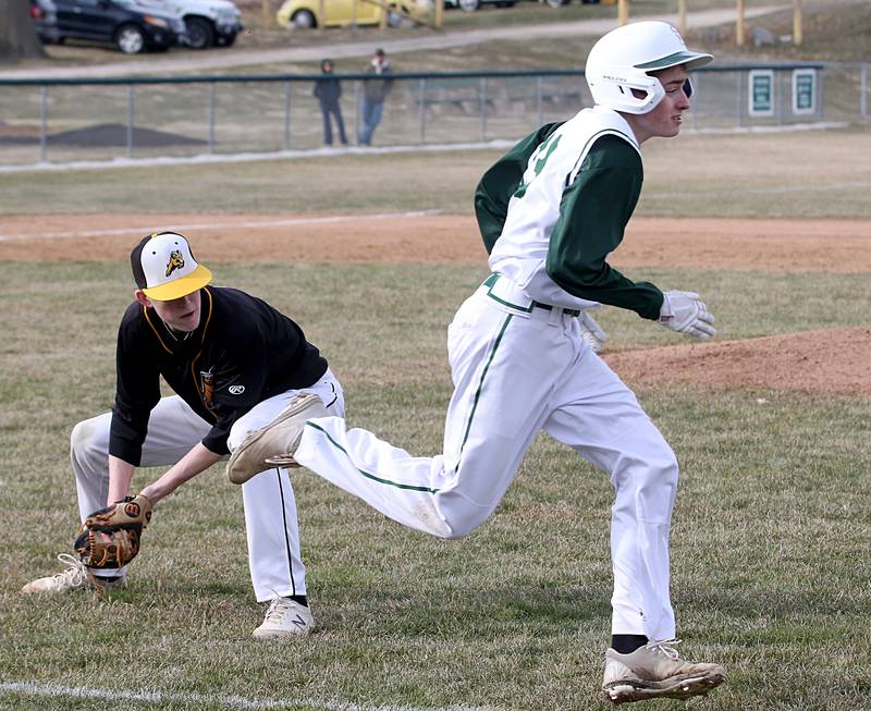 Riverdale's Jake Williams throws out St. Bede's Alex Ankiewicz at first on Monday, March 20, 2023 at St. Bede Academy.