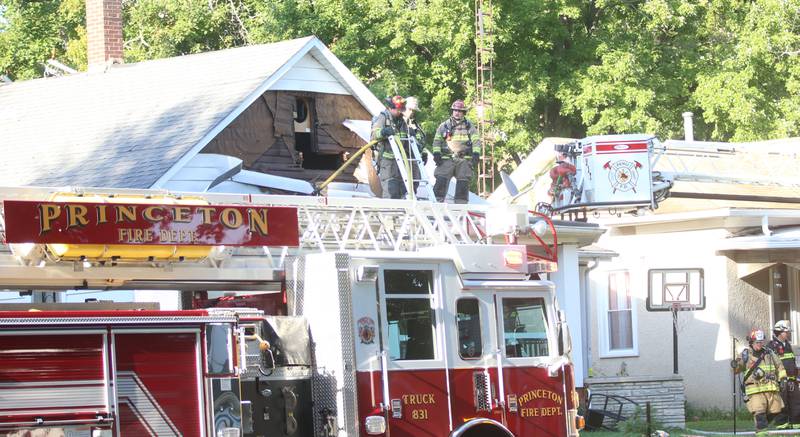 Firefighters work the scene of a structure fire in the 300 block of West Erie Street on Thursday, Aug. 28, 2025 in Spring Valley. The fire happened shortly after 4:45p.m. A Mutual Aid Box Alarm System was set out when firefighters arrived. Fire departments from Princeton, Spring Valley, Peru, Ladd, Cherry, Standard and La Salle were on the scene. Peru and Spring Valley EMS were also dispatched. Spring Valley Police assisted on the call as well.