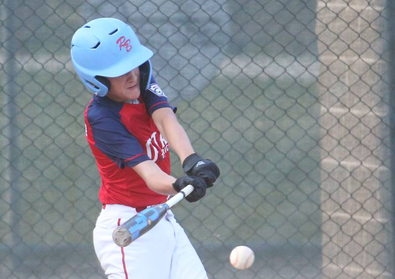 Ottawa American's Ethan Farabaugh gets a hit against Streator All Stars during the District 20 championship game on Sunday, July 14, 2024 at Washington Park in Peru.