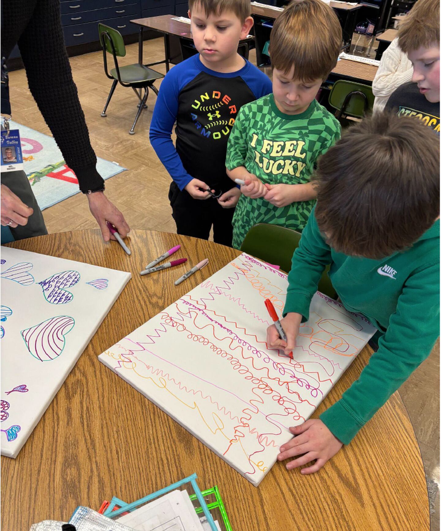 Bureau Valley Walnut Elementary students are embracing their school motto of Unity, Excellence and Pride with a special collaborative art project.  All kindergarten through fifth grade visual arts students have contributed to creating beautiful canvas artworks that showcase their creativity and teamwork.