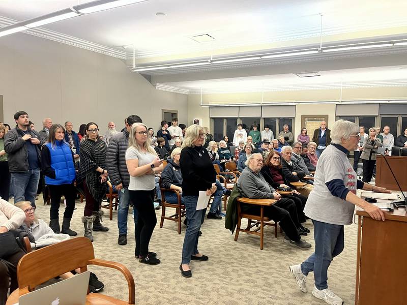 Community members lined-up in a packed room to speak during public comments of the St. Charles city council meeting on Nov. 18. Almost all speakers called for the city to ban ICE from using public property for their operations.