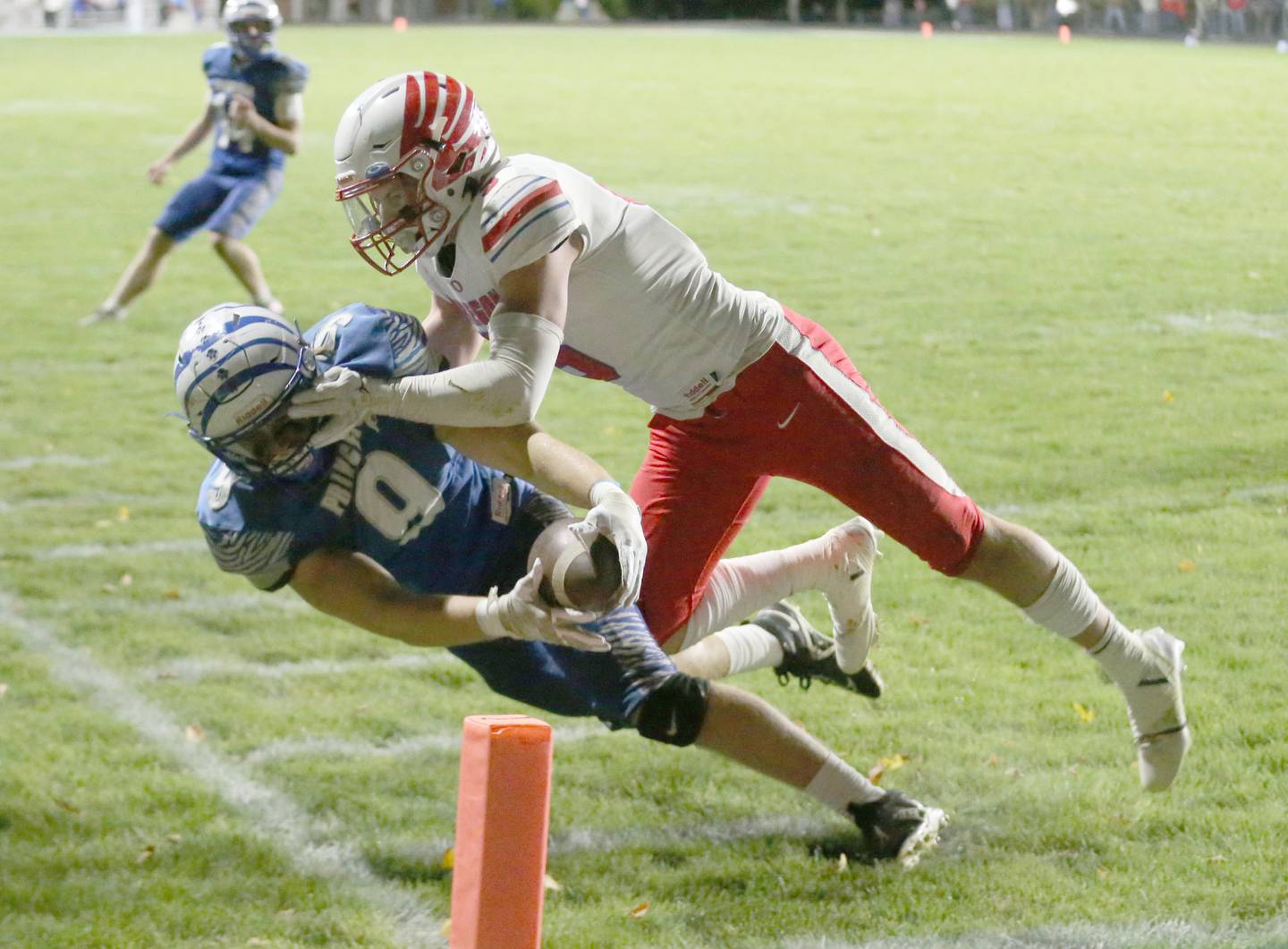 Princeton's Arthur Burden fails to reach the goal line on a conversion as Oregon's Hunter Bartel shoves him out a bounce about a half yard shy of the end zone during the Class 3A playoff game on Friday, Nov. 1, 2024 at Princeton High School.