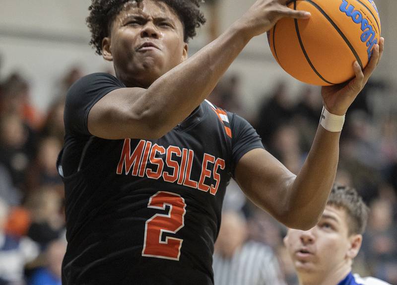 Milledgeville’s Micah Toms-Smith goes to the hoop against Newman Monday, Feb. 24, 2025, during a Class 1A Regional quarterfinal at Newman High School.