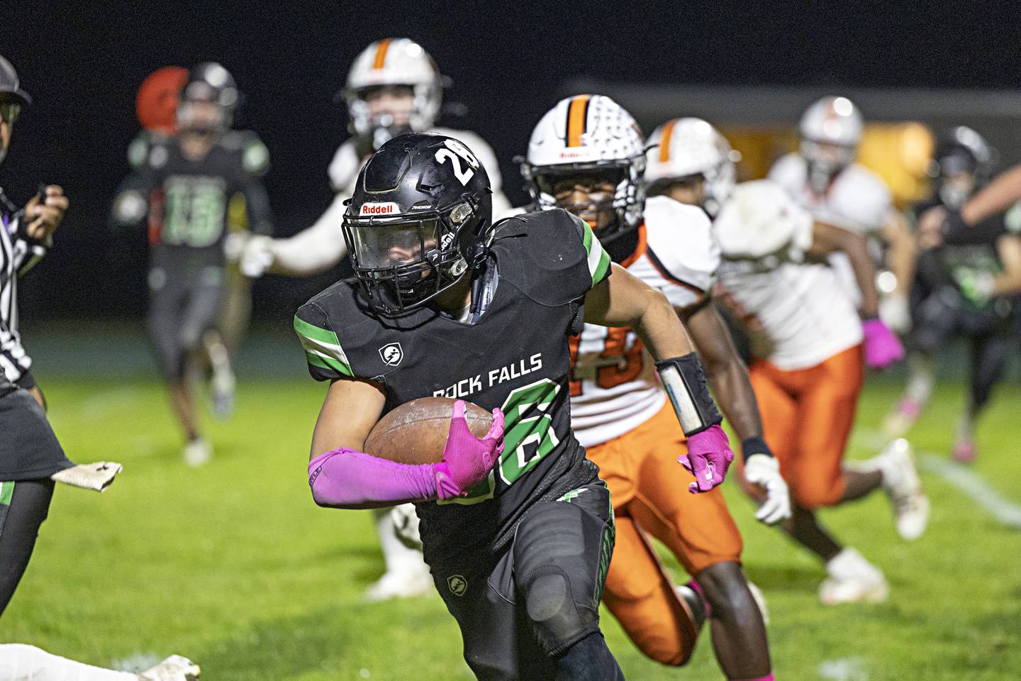 Rock Falls’ Korbin Oligney picks up yards against Winnebago Friday, Oct. 20, 2023.