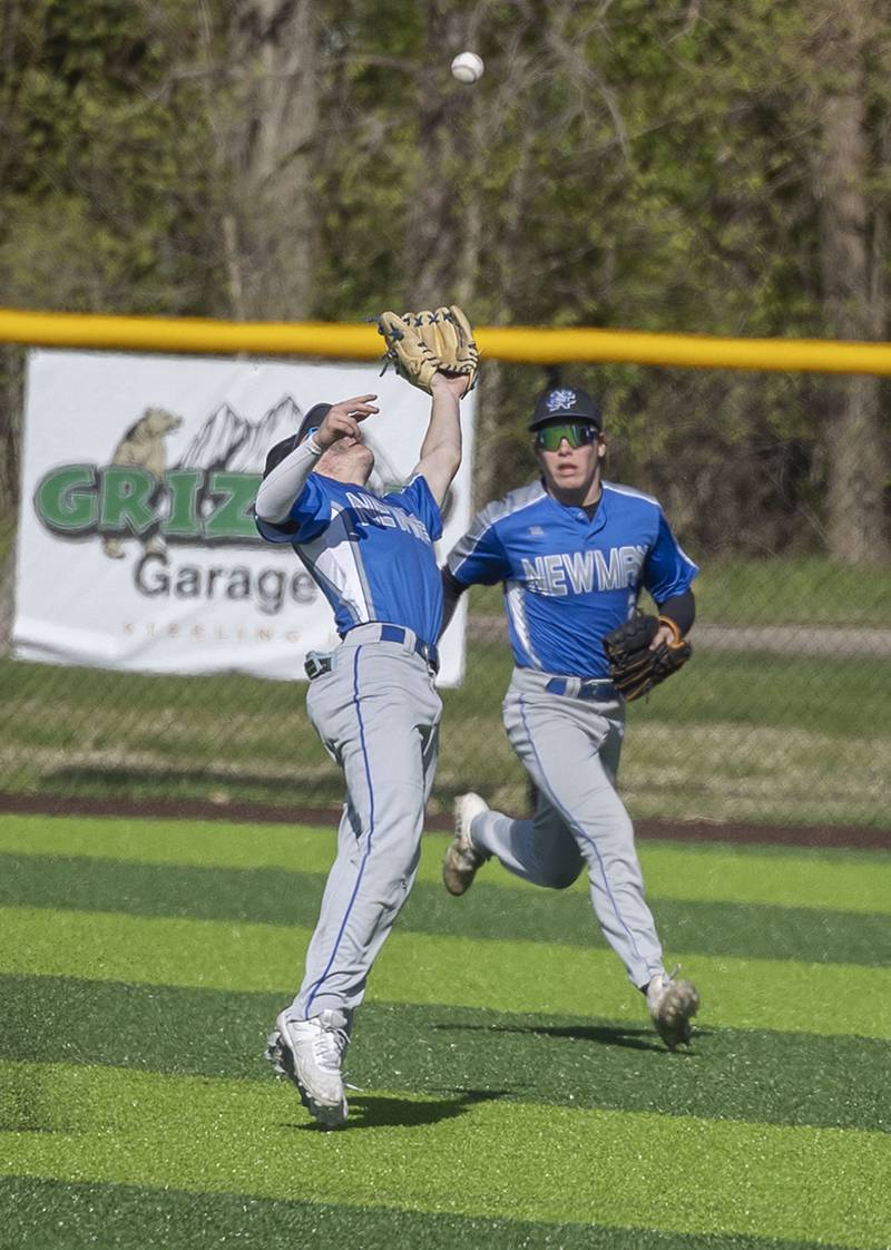 Newman’s Garret Matznick goes back in short right for a tricky catch against Sterling Wednesday, May 3, 2023.