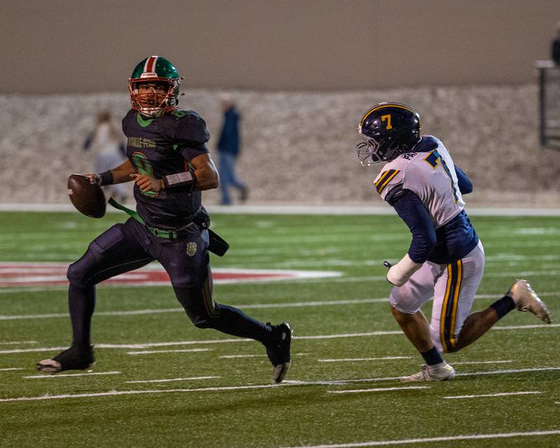 Marion Persich (8) of L-P runs ball as Triston Manrique (7) of O' Fallon chases on Friday, October 24, 2025 at Howard Fellows Stadium in LaSalle.