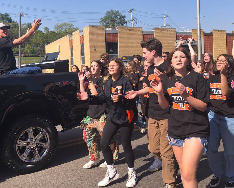 The McHenry High School choir performs in the Homecoming parade Oct. 6, 2024.
