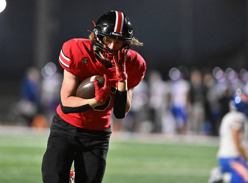 Lincoln Way Central's Tyler Tulk (15) scores a touchdown in the first quarter during the Class 7A second round playoff game against Hoffman Estates on Friday, Nov 08, 2024 at New Lenox. (Dean Reid for Shaw Local News)
