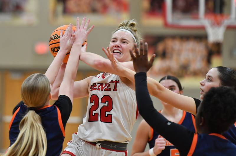Benet’s Bridget Rifenburg (22) tries to get to the basket as the Naperville North defense swarms her during the Class 4A Benet Regional championship game on February 20, 2025 at Benet Academy in Lisle.