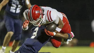 Photos: Yorkville football travels to Oswego for matchup with East