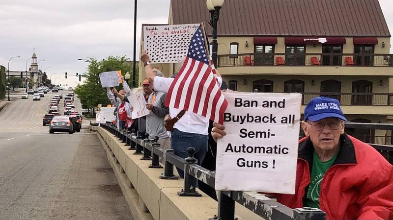 Protesters with Moms Demand Action occupied the Route 38 bridge over the Fox River in Geneva Saturday May 13, 2023, to protest gun violence and call for legislative reform.