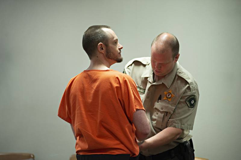 Seth Wallace is shackled at the end of his trial in a Whiteside County courtroom Thursday, Aug. 25, 2022. Wallace, accused of aggravated battery with use of a firearm, was found not guilty by reason of insanity. Wallace had fired several shots and injured four people in The Cooler in April of 2017.
