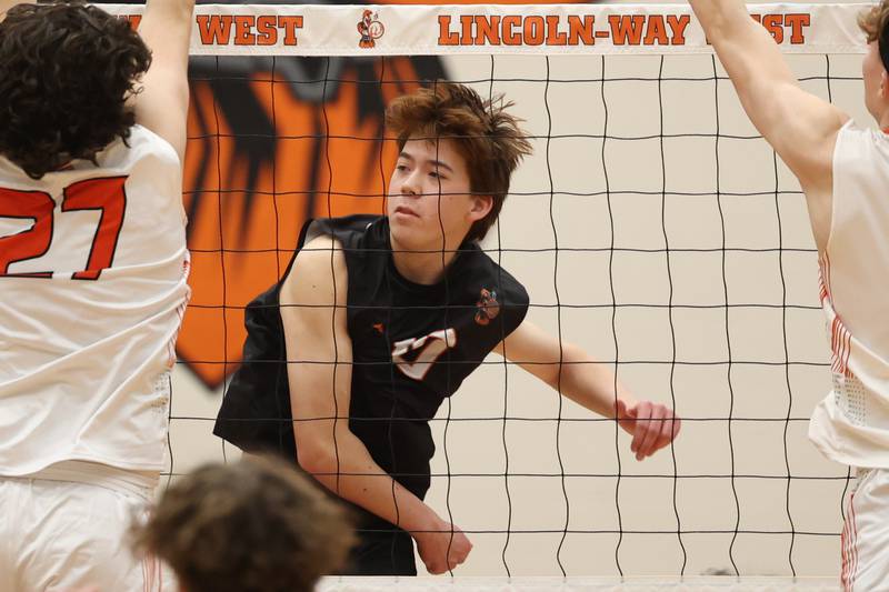 Lincoln-Way West’s William Pluskota hits a shot against Plainfield East on Wednesday, March 22nd. 2023 in New Lenox.