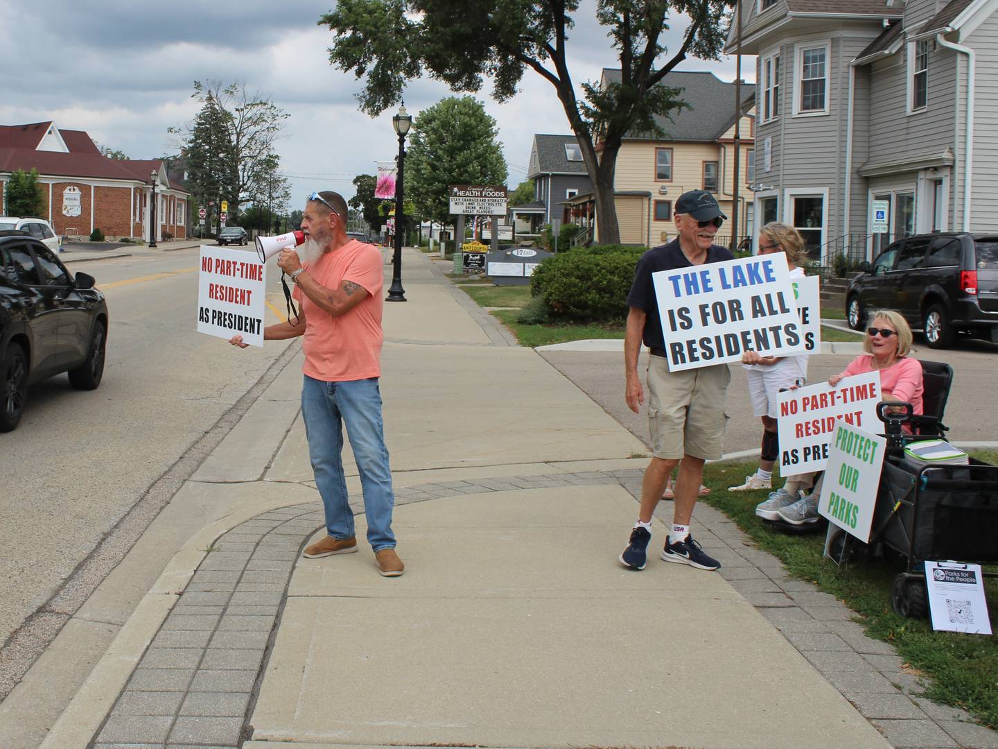 About 40 people rallied in support of the Crystal Lake Park District – and against recent actions by the park board – at a rally on Aug. 12, 2025, in front of park district headquarters.