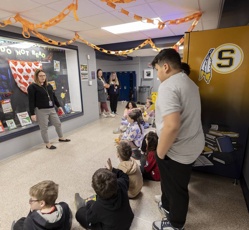 Lincoln School principal Cindy Frank speaks to students Tuesday, March 25, 2025, about the new book vending machine installed at the Sterling elementary school.