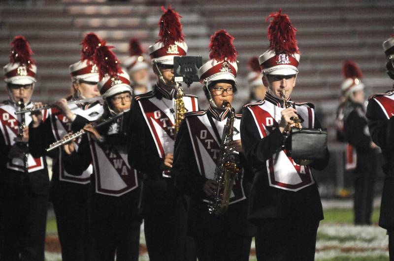 The Ottawa High School marching band performs before the homecoming game at King Field on Friday, Sept. 29, 2023.
