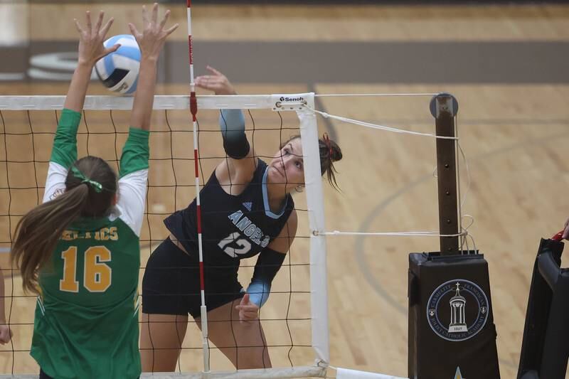 Joliet Catholic’s Ellie Blotnik powers a shot against Providence on Thursday, Sept. 14, in Joliet.