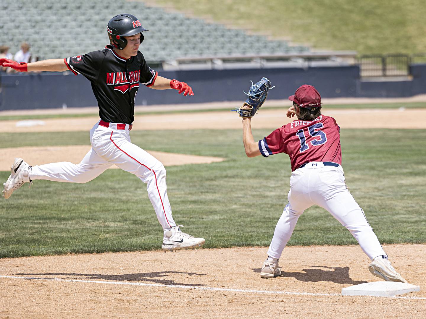 Henry-Senachwine’s Preston Rowe tries to beat out a throw at first against Gibrault Saturday, June 3, 2023 during the IHSA class 1A championship baseball game.