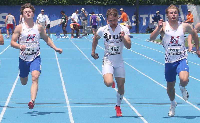 (From Left) Morrison's Levi Milder, Lena-Winslow's Alec Schlichting and Morrison's Brady Anderson race in the 100 meter dash during the IHSA Class 1A Boys Track & Field State Finals on Saturday, May 31, 2025 at Eastern Illinois University in Charleston.