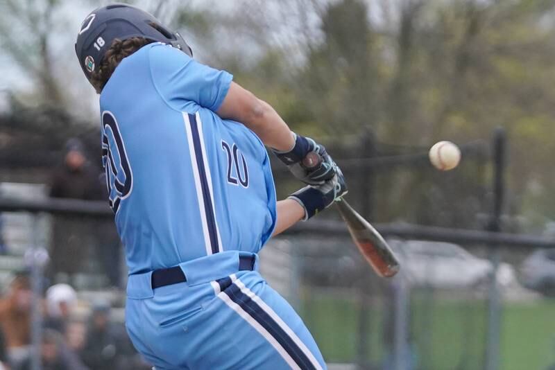 Lake Park's Christopher Ray (20) hits a two run double against Geneva during a baseball game at Geneva High School on Wednesday, April 17, 2024.