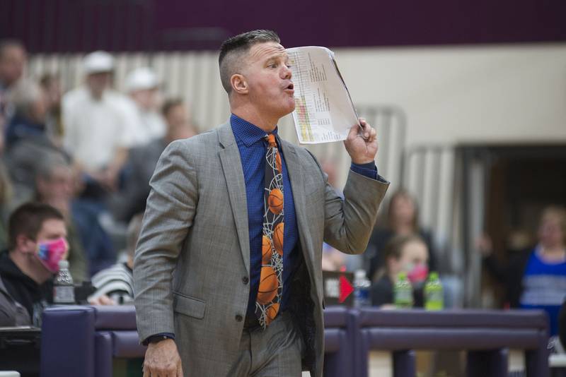 Newman coach Ray Sharp shouts from the sidelines March 2, 2022 during the Comets' sectional win in Pecatonica.
