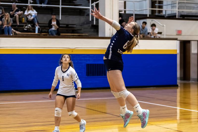 Lisle's Kendall Kolff goes up for a kill during a varsity volleyball away game against Joliet Central on Sept. 22, 2025.