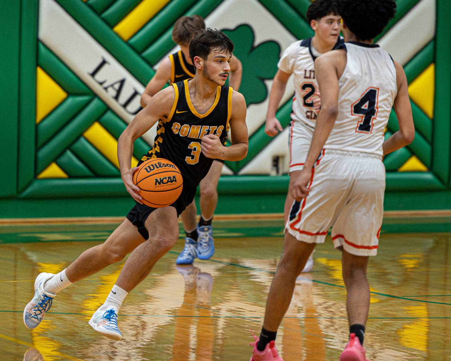 Jesse Tresouthick (3) of Reed-Custer dribbles ball down court during game against DePue in the Shipyard Showdown on Tuesday, December 23, 2025 at Seneca High School in Seneca.