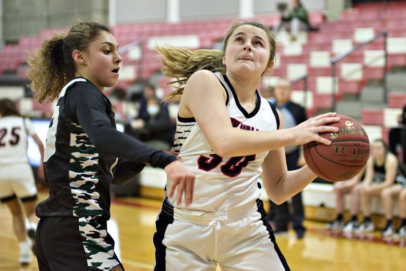 Sauk Valley College's Skylar Savage works below the basket against Kishwaukee Thursday, Jan. 13, 2022.