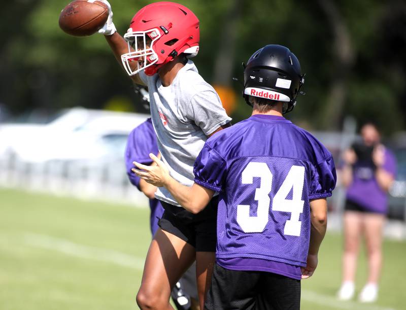 Yorkville’s Dyllan Malone makes a catch during a 7-on-7 tournament at West Aurora High School on Friday, July 19, 2024.