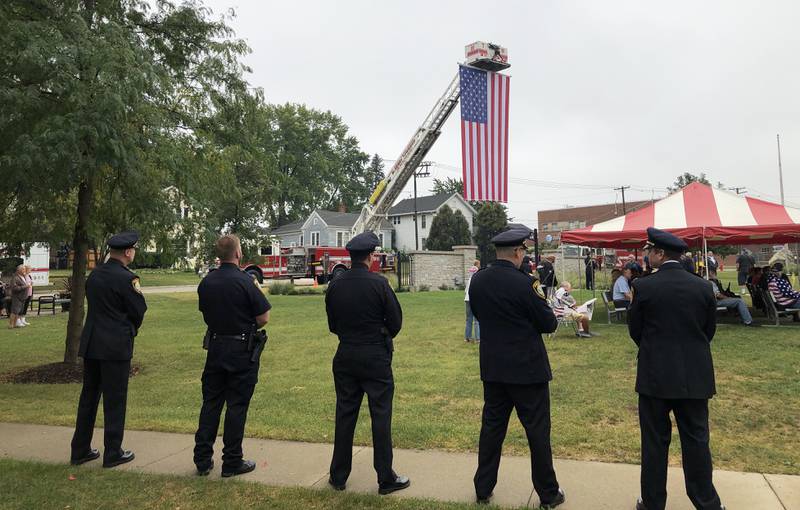 Members of the McHenry Police Department standby at the city's annual 9/11 remembrance ceremony on Monday, Sept. 11, 2023, at McHenry's Veterans Memorial Park.