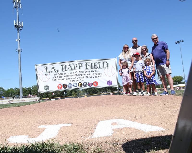 J.A., Morgan, Bella, Sloan, James "JJ" Sue and Jim Happ pose for a photo during the J.A. Happ Day and field dedication on Sunday, July 30, 2023 at Washington Park in Peru. during the J.A. Happ Day and field dedication on Sunday, July 30, 2023 at Washington Park in Peru.