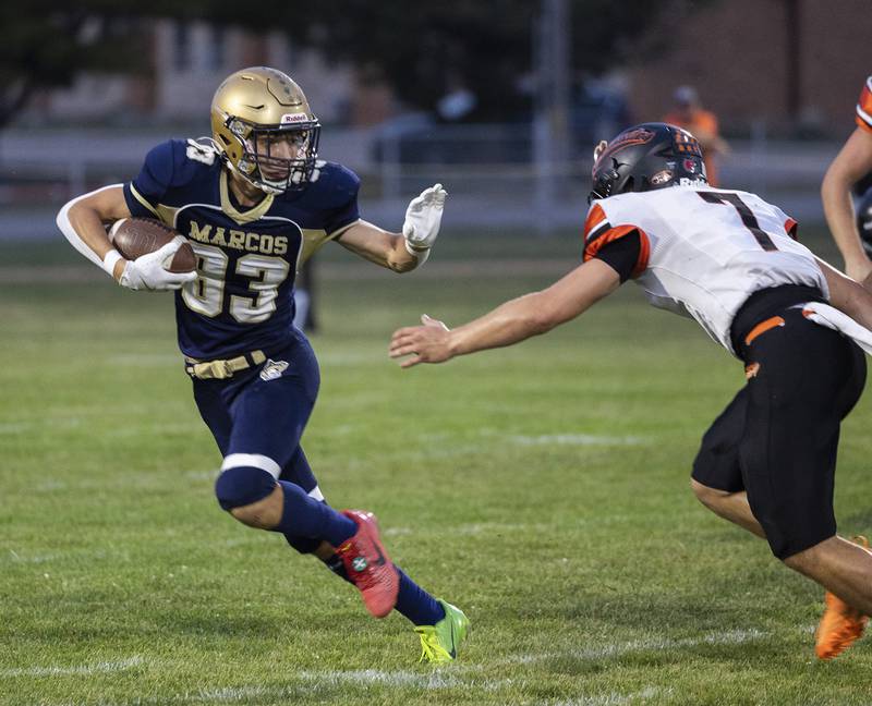 Polo’s Mercer Mumford looks for room to run against Milledgeville Friday, Sept. 19, 2025.