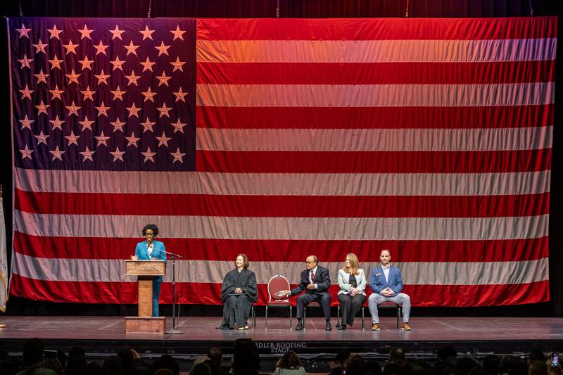 U.S. Congresswoman Lauren Underwood shares congratulatory remarks during the Naturalization Ceremony at Rialto Square Theatre in Joliet on April 17, 2025.