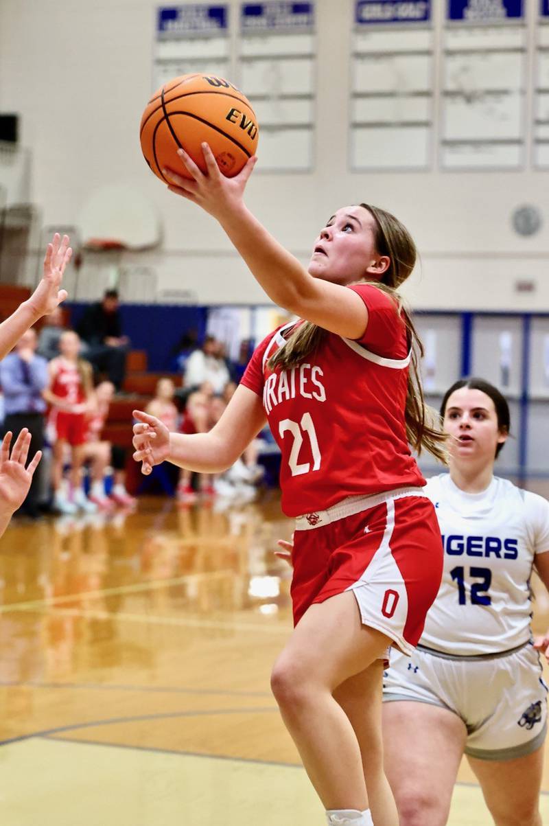 Ottawa's Hailey Thrush takes in a first-half layup Tuesday night at Prouty Gym. The Pirates won 44-40.
