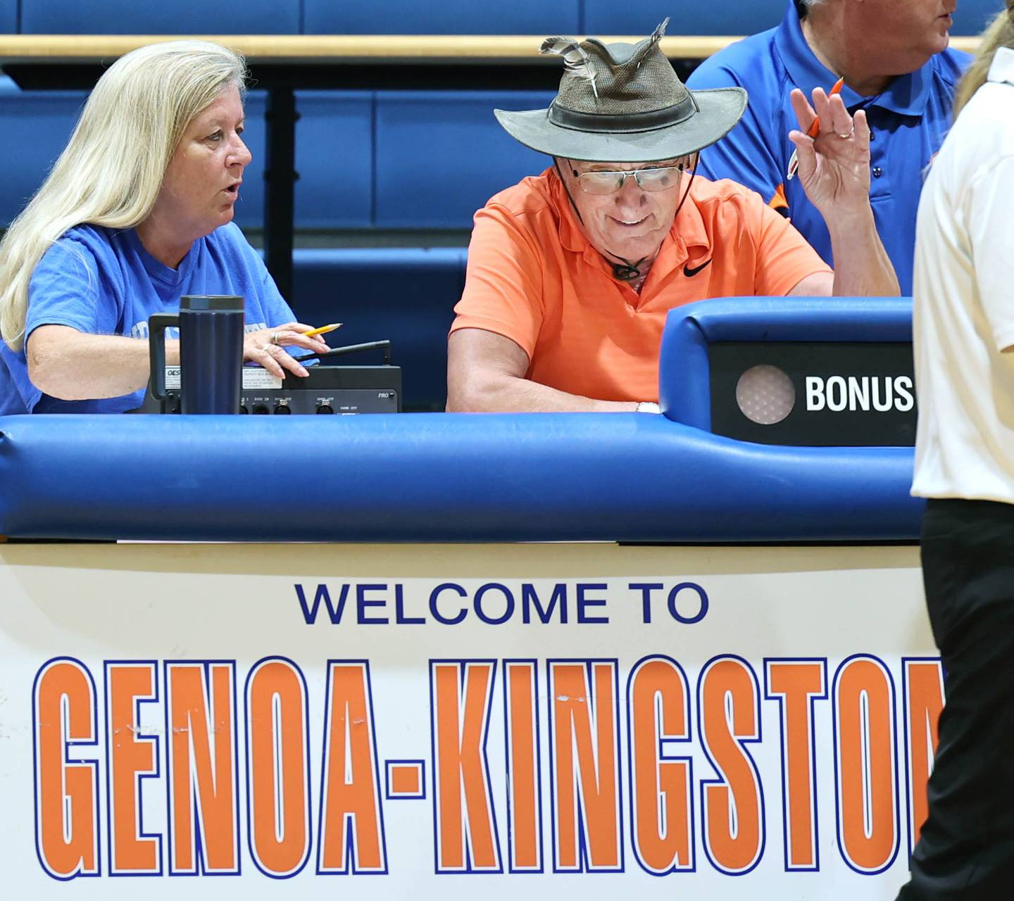 U.S. Navy veteran Jim Kush has a laugh Tuesday, Sept. 5, 2023, at Genoa-Kingston High School while working as the official score keeper for the Genoa-Kingston volleyball team. Kush has also sung the National Anthem at Genoa-Kingston sporting events.