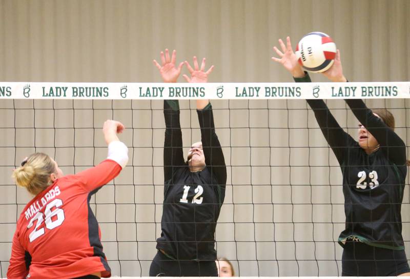 Henry-Senachwine's Brooklyn Thompson has her spike blocked by St. Bede's Mary Quinn McClain during the Class 1A Regional final game on Thursday, Oct. 31, 2024 at St. Bede Academy.