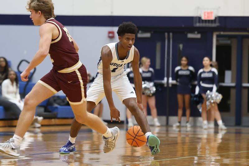 Plainfield South’s Kaiden Brown works the ball at the top of the key against Morris on Wednesday, Jan. 28, 2026 in Plainfield.