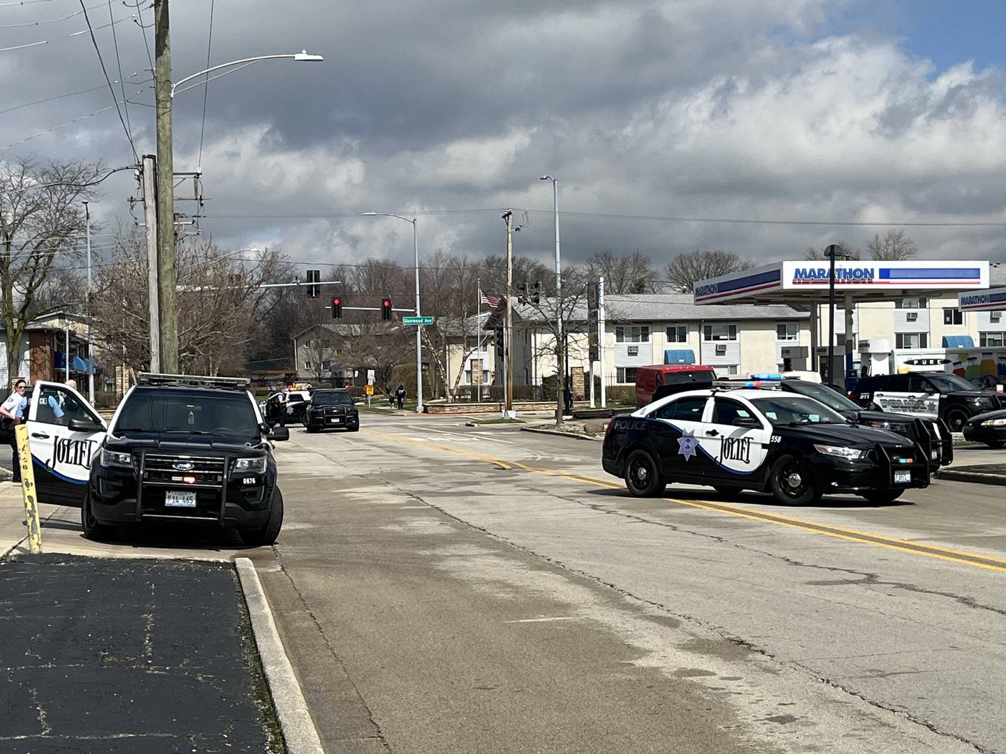 Joliet police officers at the scene of a shooting on Thursday, March 14 on Republic Avenue in Joliet.