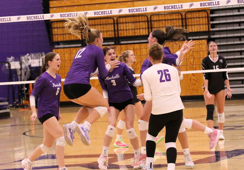 Rochelle players celebrate their three-set win over Kaneland on Sept. 23, 2025.