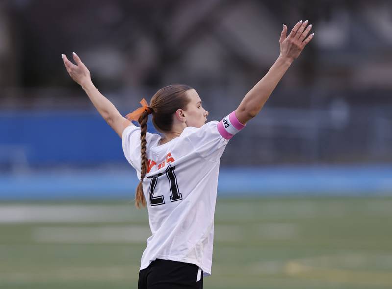 Wheaton Warrenville South's Ashlyn Adams (21) celebrates scoring a goal during the girl's varsity soccer match between Lyons Township and Wheaton Warrenville South high schools on Thursday, March 27, 2025 in Western Springs.