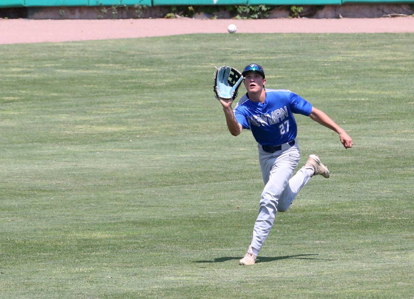 Newman's Brendan Tunink makes a catch on the run against Henry-Senachwine during the Class 1A State semifinal game on Friday, June 2, 2023 at Dozer Park in Peoria.
