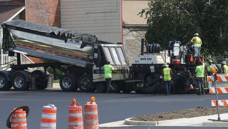 Crews with Advanced Asphalt pave the entrance to the Prineton Train Depot on Monday, Aug. 5, 2024. In May, The Princeton City Council approved a $542,952 agreement with Advanced Asphalt to complete the work.The parking lot is expected to open later this month.