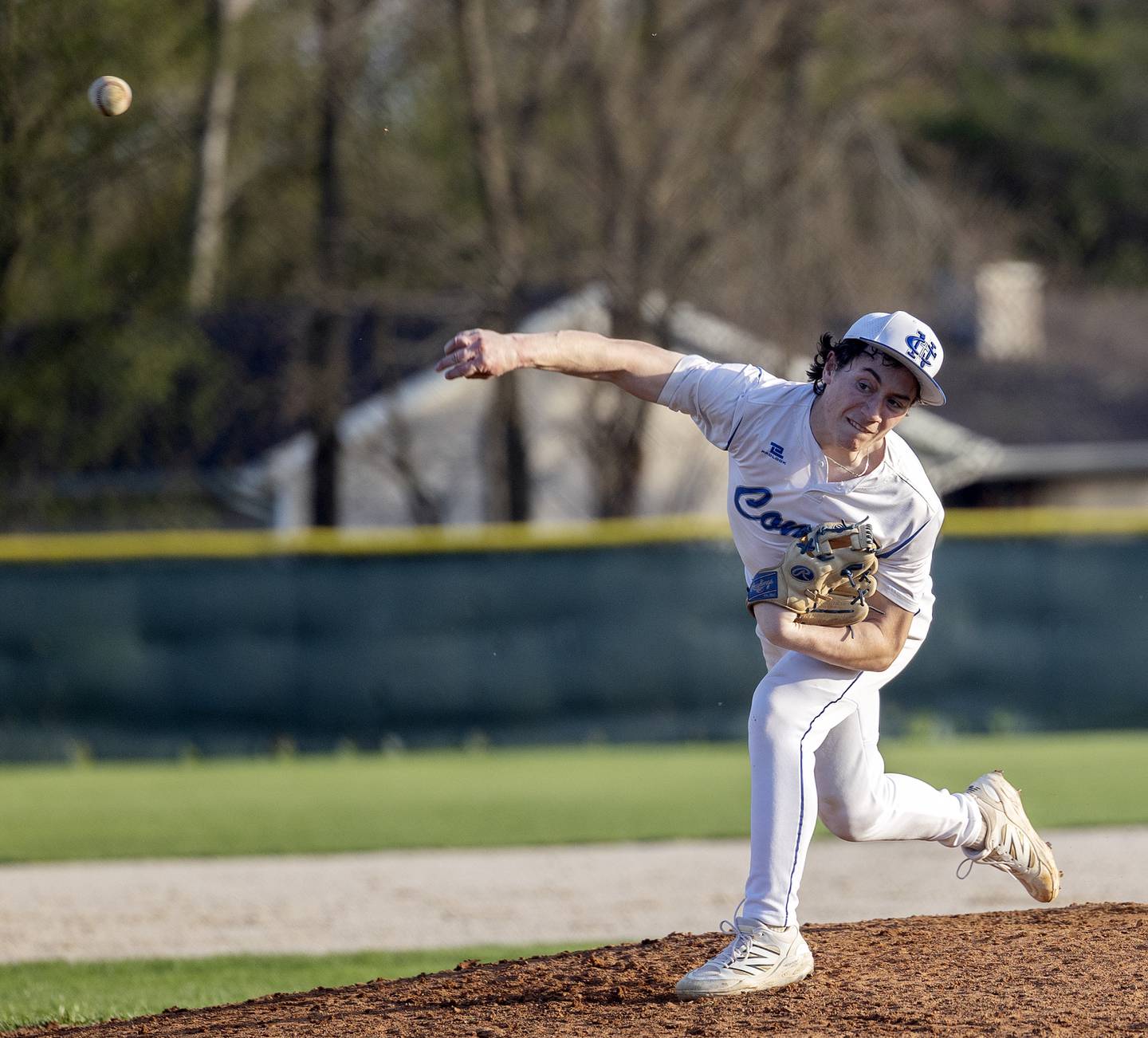 Newman’s Garret Matznick fires a pitch against Rock Falls Wednesday, April 23, 2025.