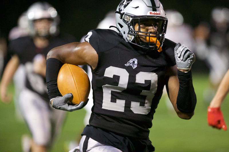 Kaneland's Aric Johnson runs the ball for a gain against Ottawa on Friday, Sept. 22, 2023 in Maple Park.