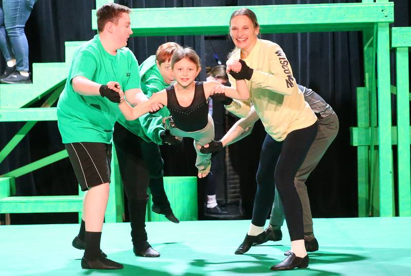 Eloise Gatza as Young Tarzan and gorillas- Jackson Layhew, Susan Hagerty, Monika Sudakov and Karsen Gromm act out a scene during a rehearsal on Thursday, Jan. 16, 2025 at Stage 212 in La Salle.