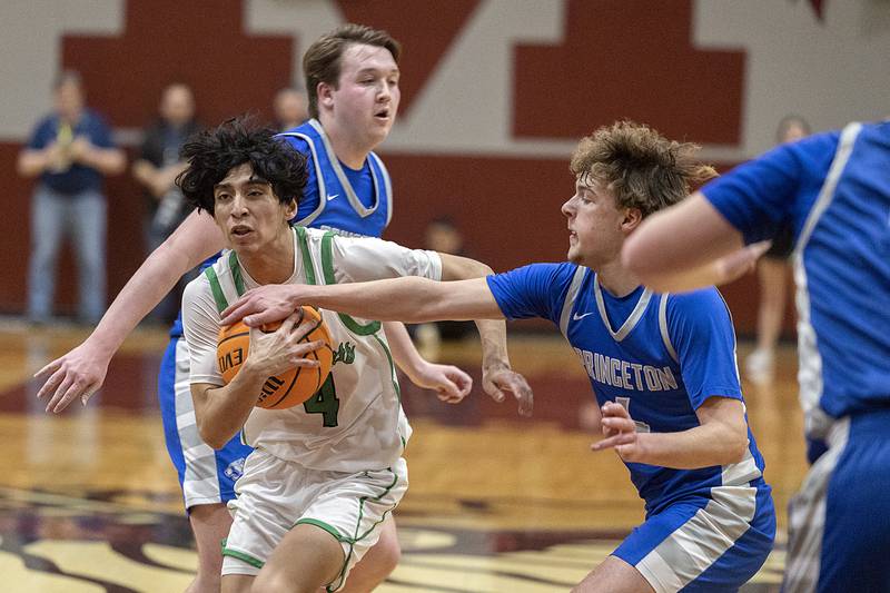 Rock Falls’ Christian Hernandez drives the lane against Princeton Friday, March 7, 2025, in the Class 2A boys basketball Sectional final in Marengo.