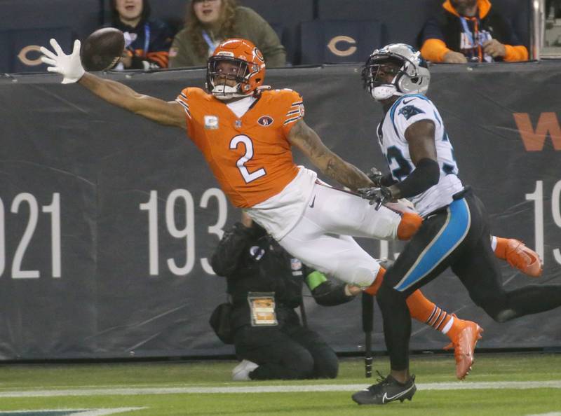 Chicago Bears wide receiver DJ Moore misses a catch as Carolina Panthers corner back Dicaprio Bootle defends on Thursday, Nov. 9, 2023 at Soldier Field.