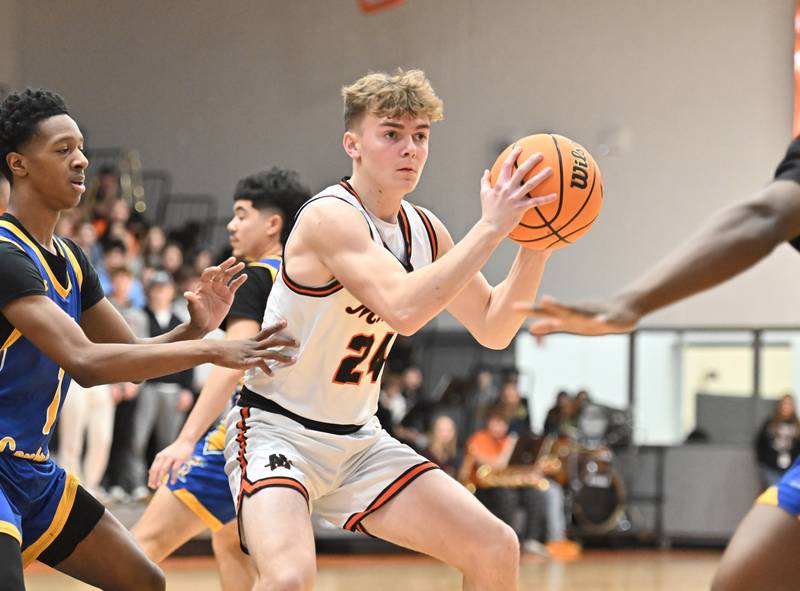 Minooka's Brady Hairald (24) in action during a conference game against Joliet Central on Friday, Jan. 10, 2025, at Minooka.