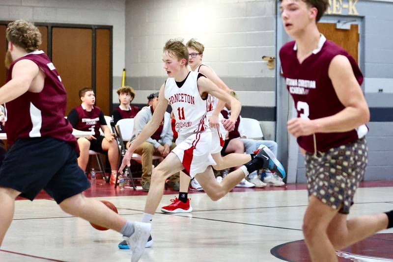 Princeton Christian Academy's Andrew Gibson brings the ball upcourt against Ottawa Christian Academy Tuesday at Howard Hoffman Memorial Gym. The Eagles won 57-42.
