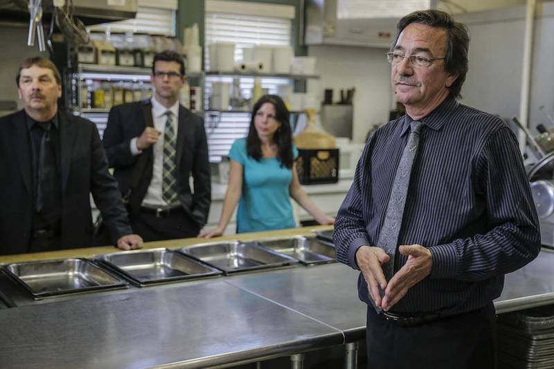 Jeff Bussean, operator of The Grand Ballroom at Joliet Union Station, gives a tour of the banquet facility to the Joliet City Council on May 28, 2015 in Joliet.